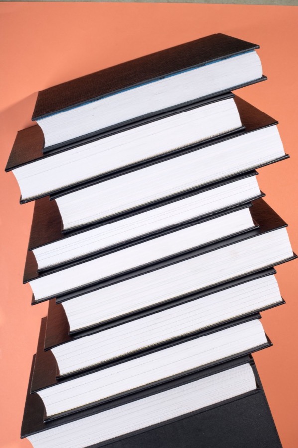 Stack of books representing project references